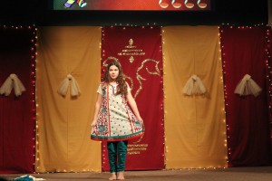 A child in a traditional outfit called a Punjabi suit