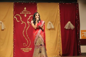 The MC of the event in a Lengha Saree