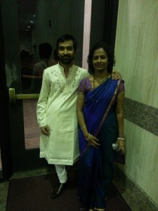 A man in a Dhoti and a lady in a Saree